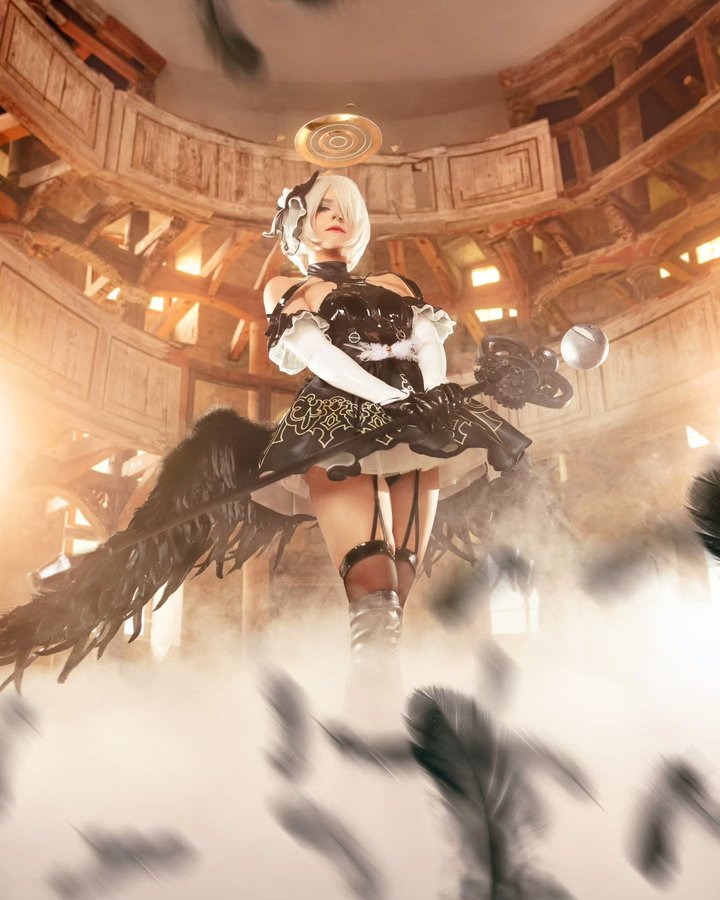 Instagram post by @pixelmaniaevent for Uwowo Cosplay. Caption reads: 🖤Happy 15th Anniversary to Nier Series🖤

I can't....