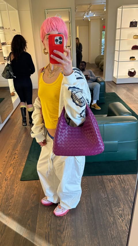 Instagram post by @valrosic for NUDIENT. Caption reads: had to match my fit to my nudient phone case cuz....