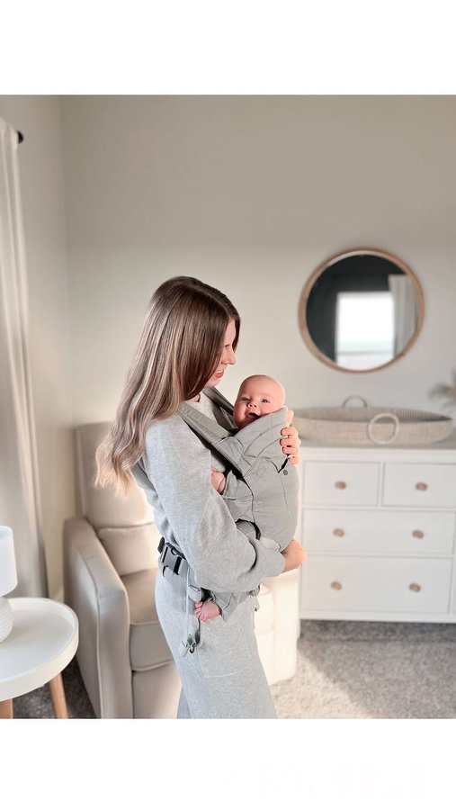 Instagram post by @mrskatiecarlson for Baby Trend. Caption reads: Comment “CARRIER” for all the link! 🔗....