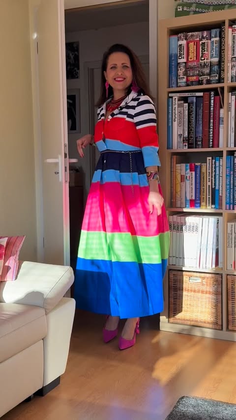 Instagram post by @carmenkayser for Uoozee. Caption reads: [...] Loving this striped colorful dress from....