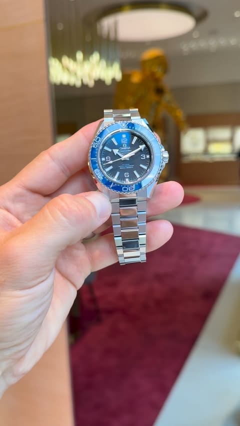 Instagram post by @modernwatchguyatx for OMEGA. Caption reads: Taking in the view of the new #planetocean release....