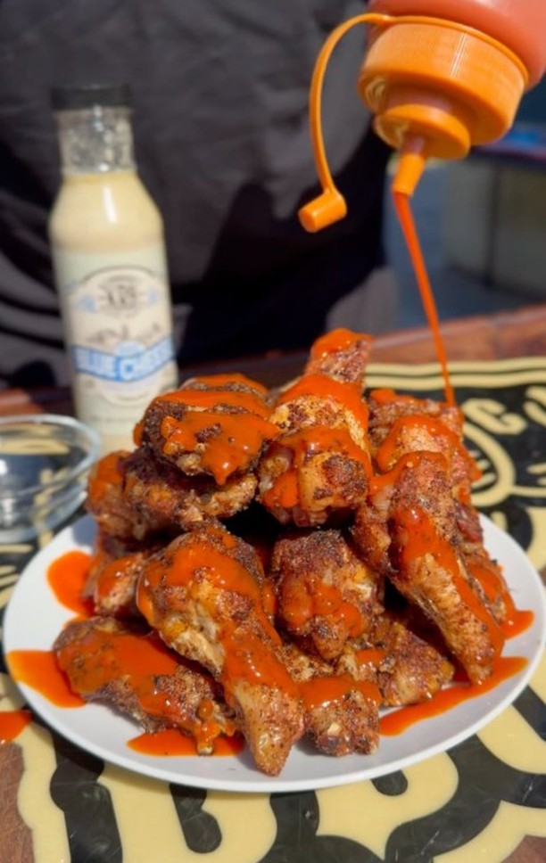 Instagram post by @kendrick_bbq for Traeger Grills. Caption reads: 🔥 Wing Week is ON. 🔥

To kick off Week 1 of....