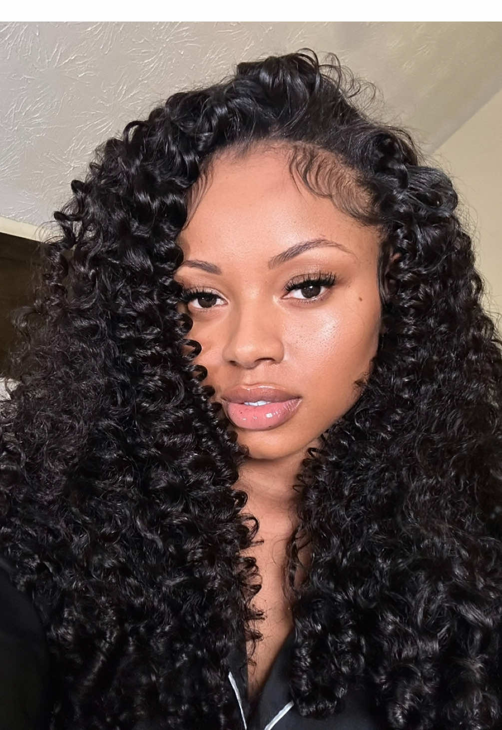 TikTok post by @quincybatson for Curlyme. Caption reads: [...] by step on how i install my half wig....