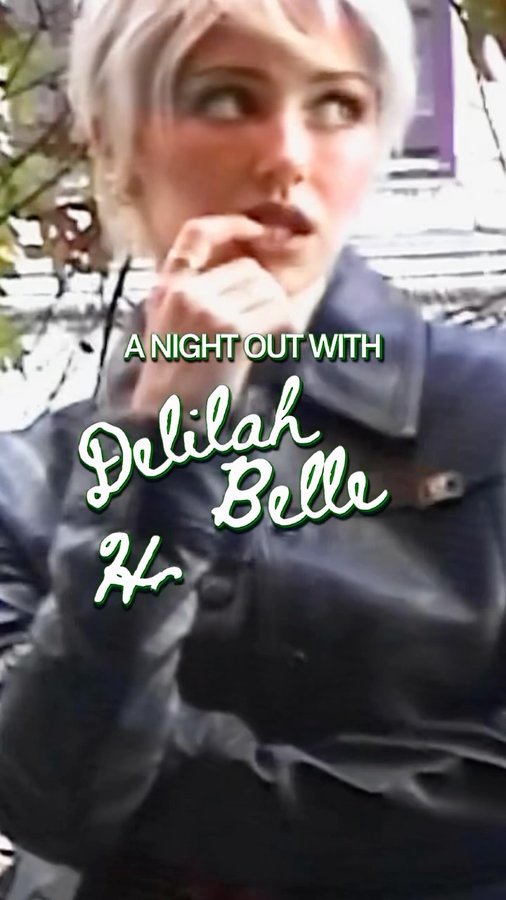 Instagram post by @delilahbelle for NYLON. Caption reads: [...] late for the ball with her Tabby ;)....