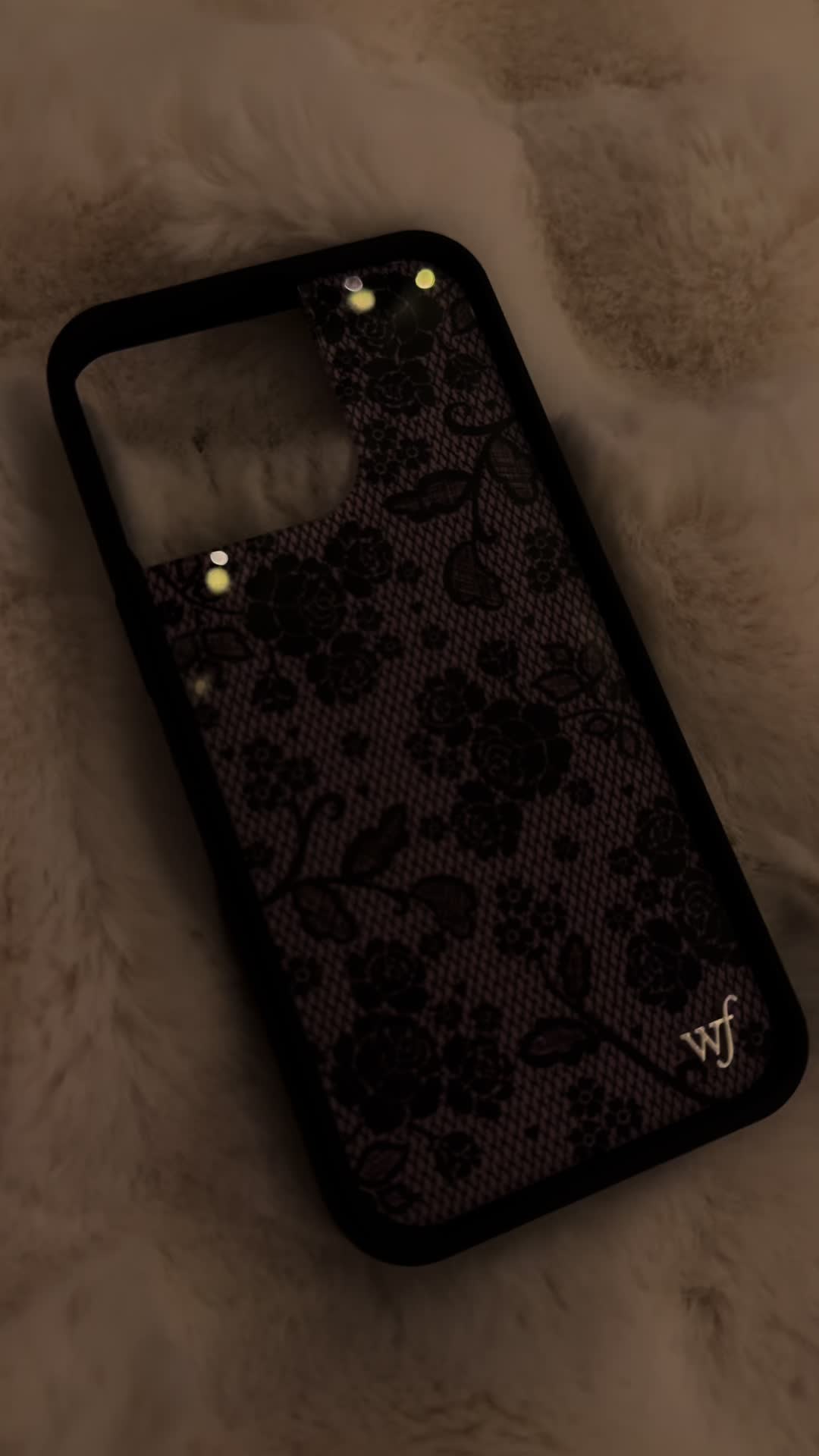 TikTok post by @miseryinlace for Wildflower Cases. Caption reads: @Wildflower Cases #phonecase #blacklace....