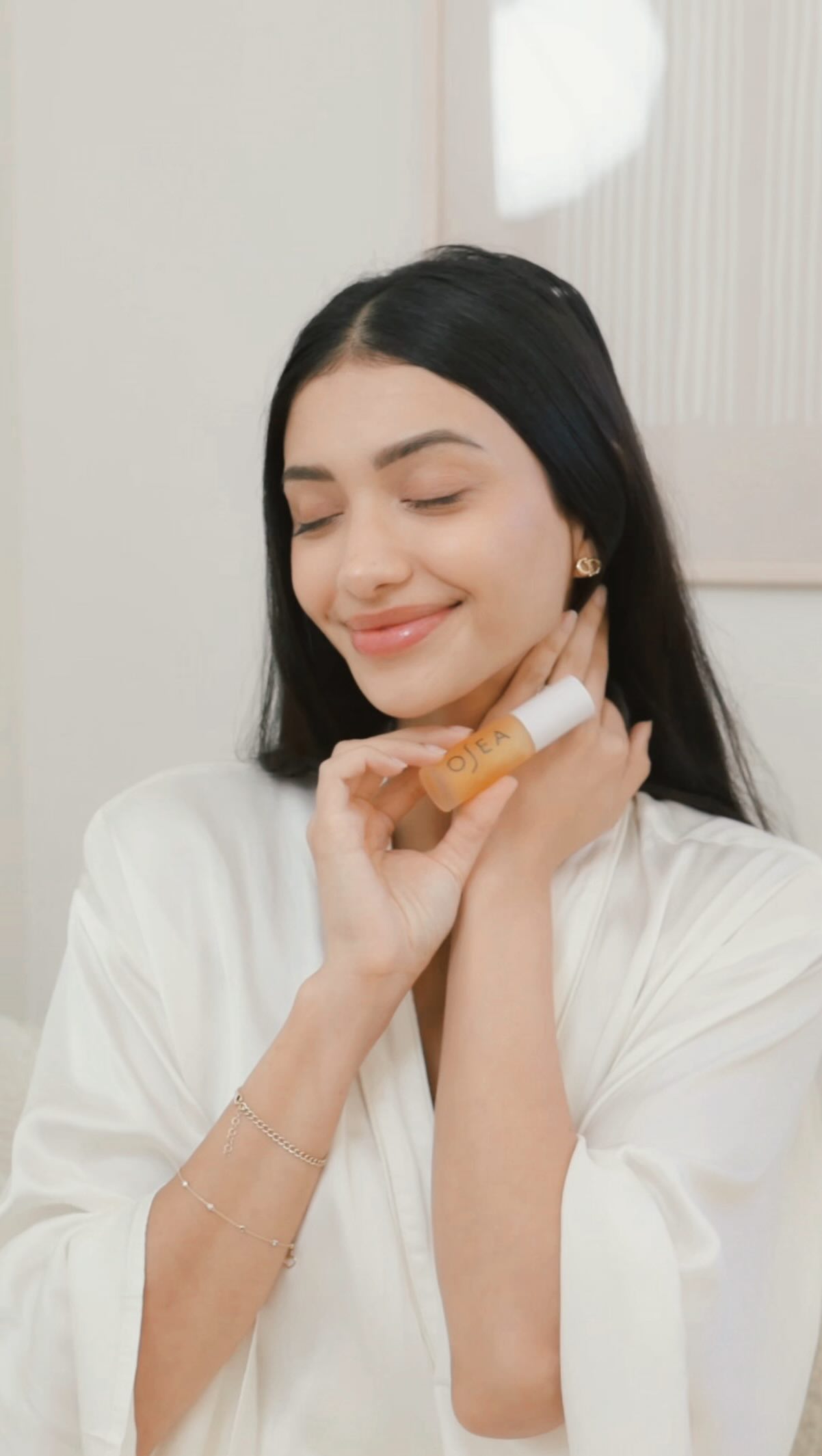 Instagram post by @alannapanday for OSEA Malibu. Caption reads: Two icons, one box, and a holiday glow like no....