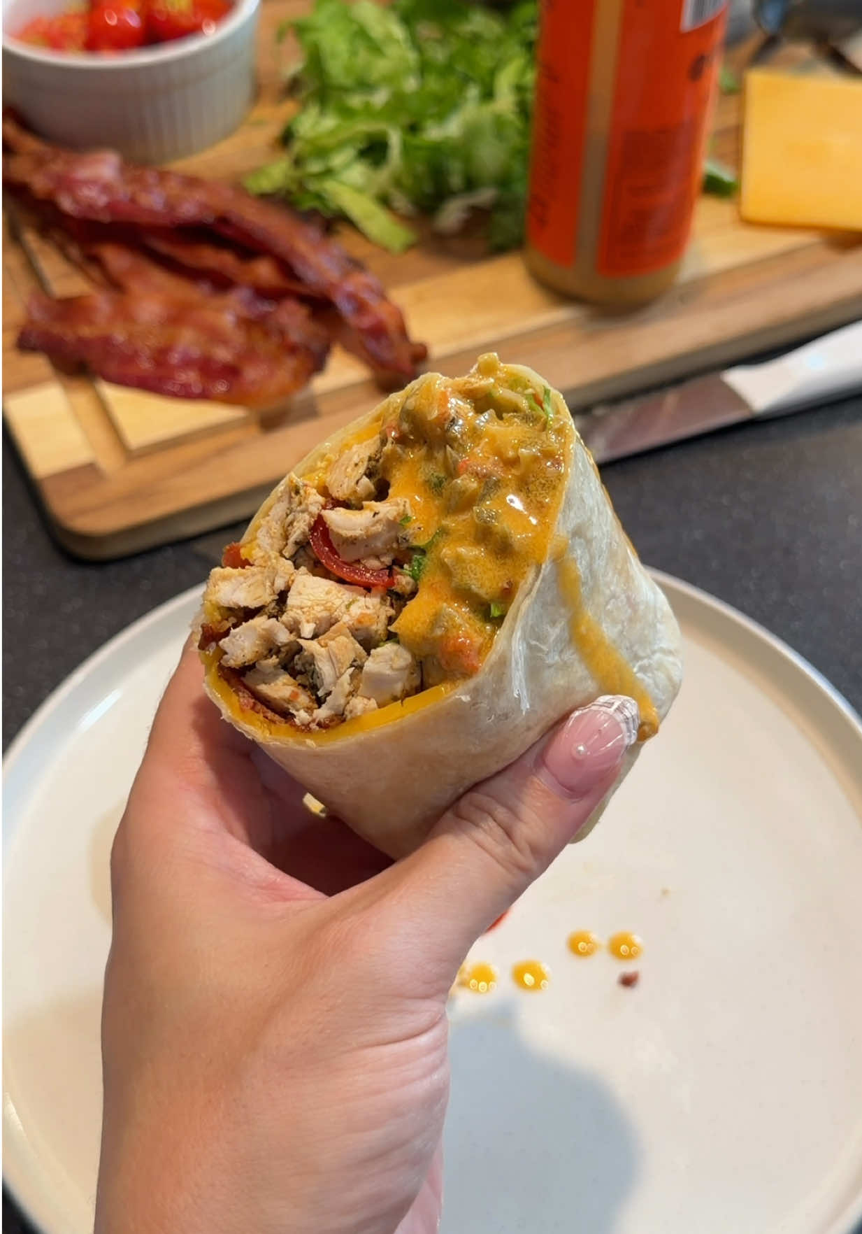TikTok post by @meatupfordinner for Ayoh!. Caption reads: [...] every bite? yes, yes I am 🌶️🌯 @eatayoh....