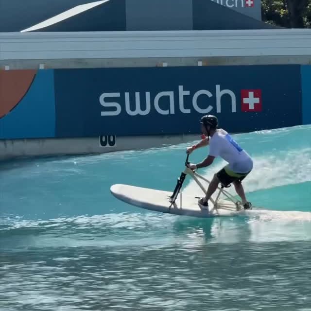 Instagram post by @sampilgrim for Swatch. Caption reads: Surf biking is born at the @swatch @thenines.cc in....