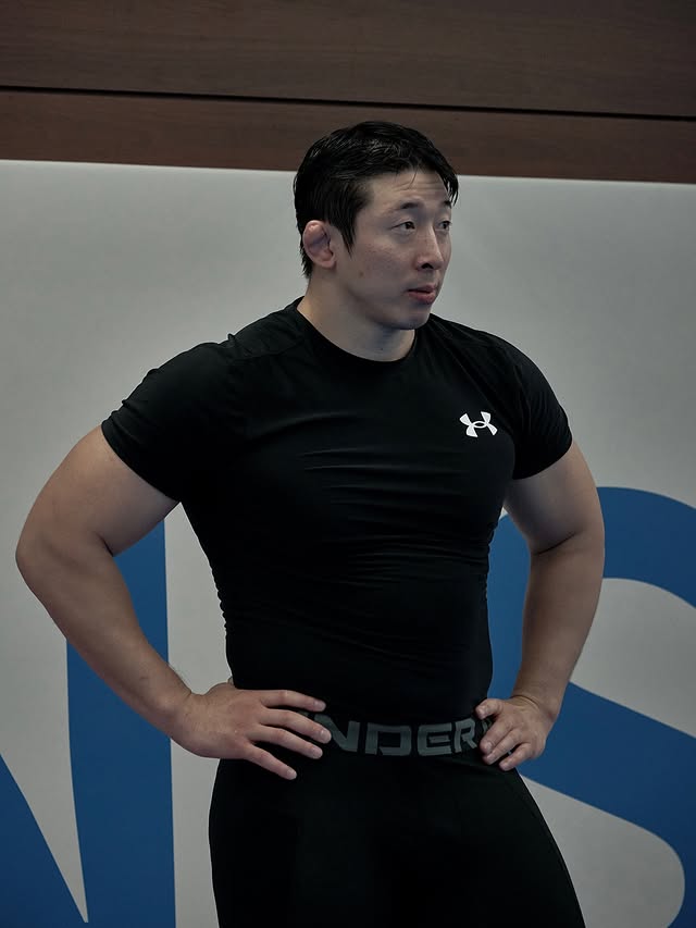 Instagram post by @wookja_ for Under Armour Korea. Caption reads: 최고의 퍼포먼스를 위해 내가 입는 이유 2026년도 언더아머와 함께 .....
