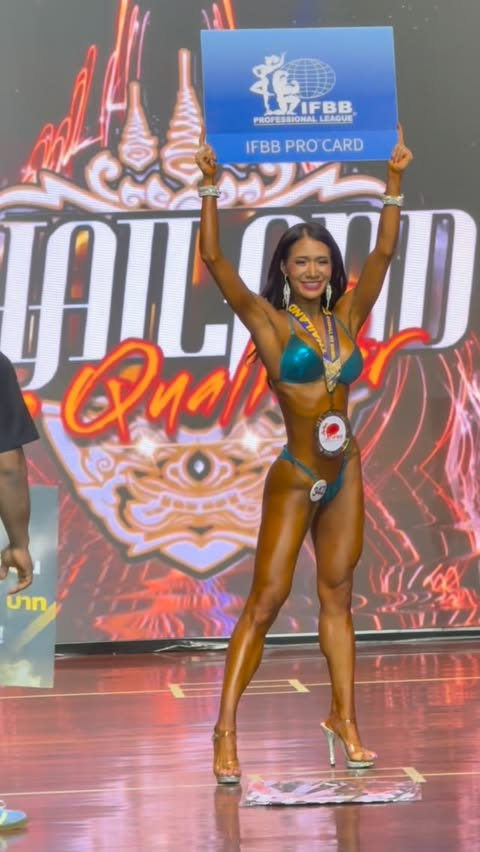 Instagram post by @donla.muaylek for Angel Competition Bikinis. Caption reads: [...] : @premier_physique_prep Suit :....