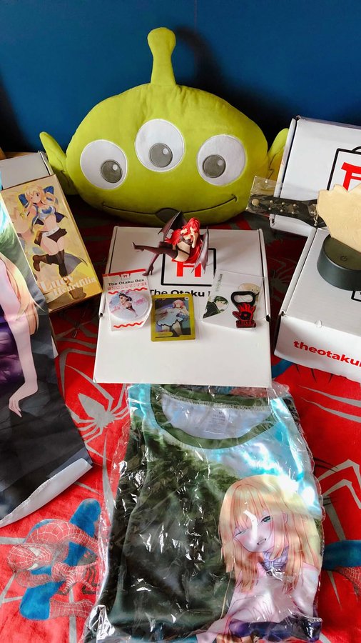 Instagram post by @alexcelsus for The Otaku Box. Caption reads: [...] you a special unboxing offered by....
