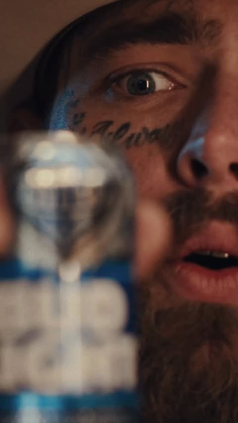 Instagram post by @postmalone for Bud Light. Caption reads: [...] cold. Introducing our new Posty Co. x Bud....
