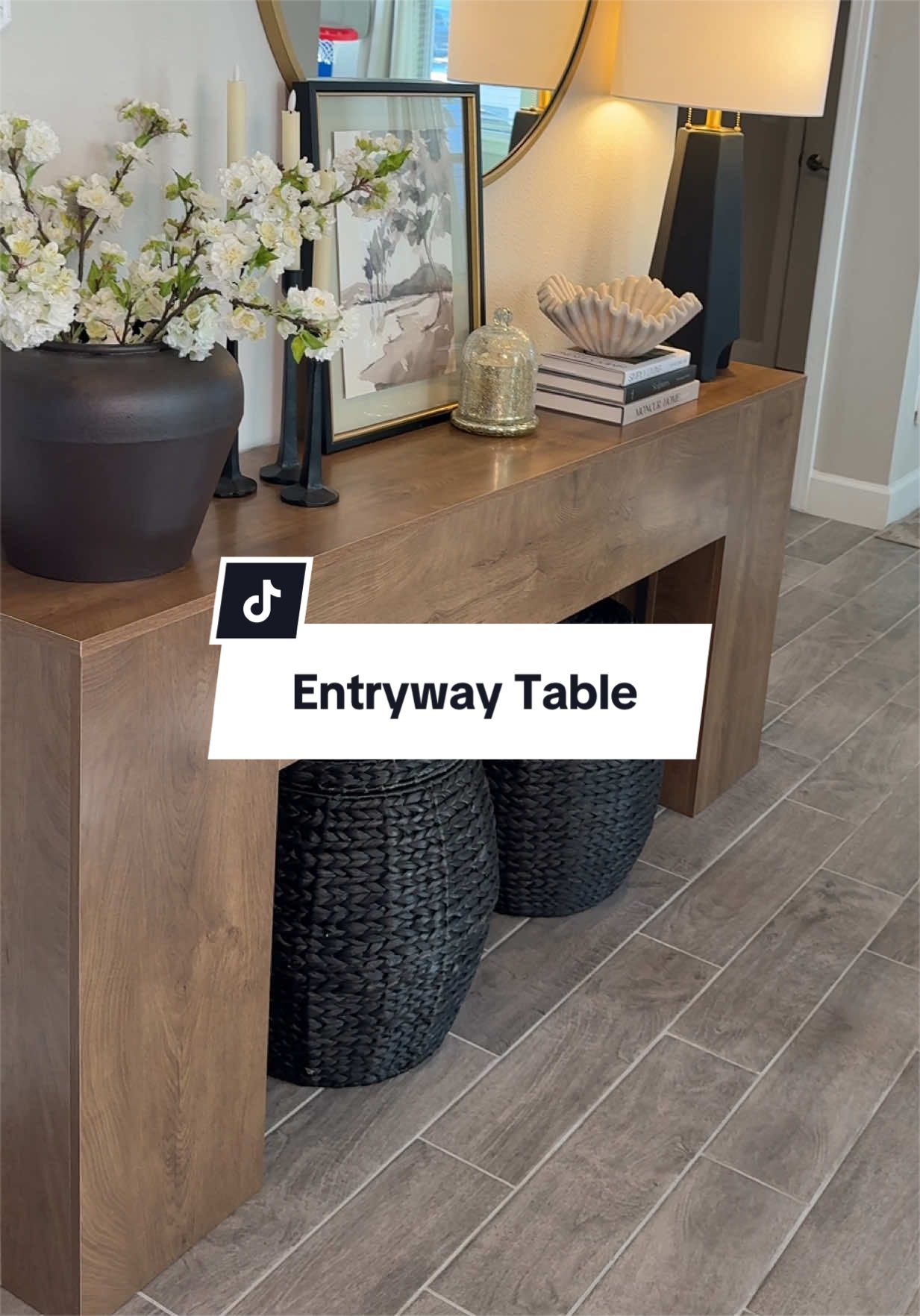 TikTok post by @reallaurakay for Tribesigns. Caption reads: [...] #entrywaydecor #entrywaymakeover @Tribesigns.