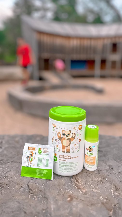 Instagram post by @lauren.clutter for babyganics. Caption reads: #ad Going to the park with kids expectation vs....