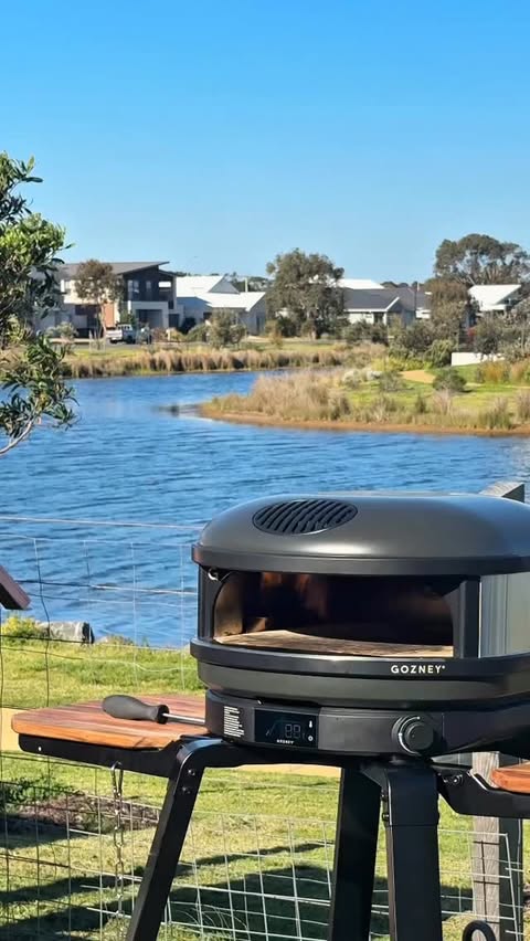 Instagram post by @amygibbsdesign for Gozney. Caption reads: When the whole family gets involved in the pizza....