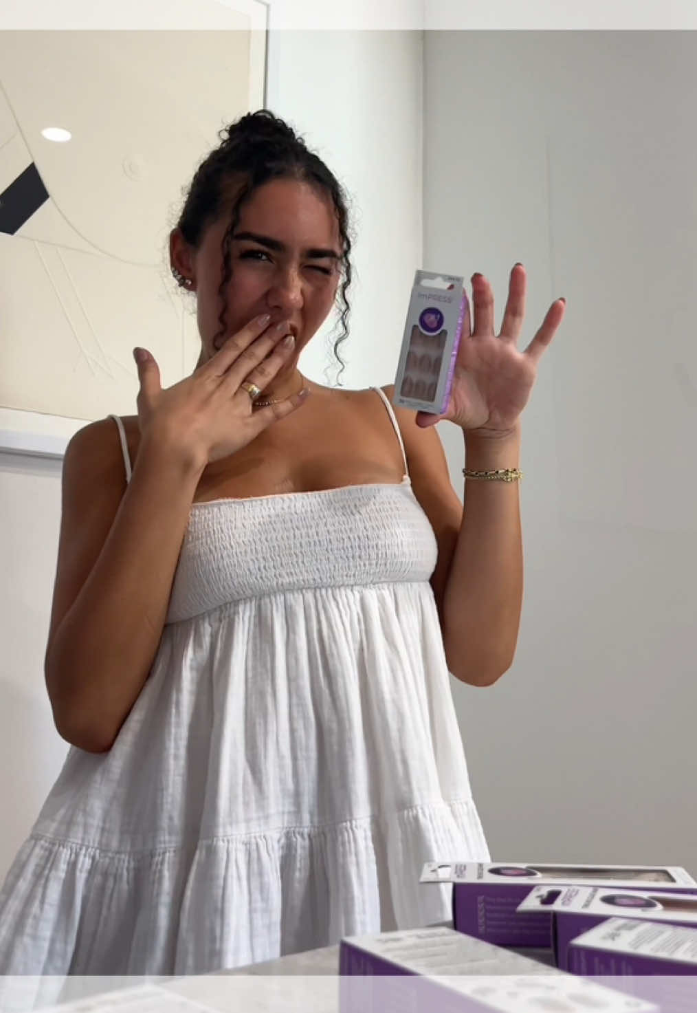 TikTok post by @tamaraavinami for impressbeauty. Caption reads: Senior year of college = no time for the nail....