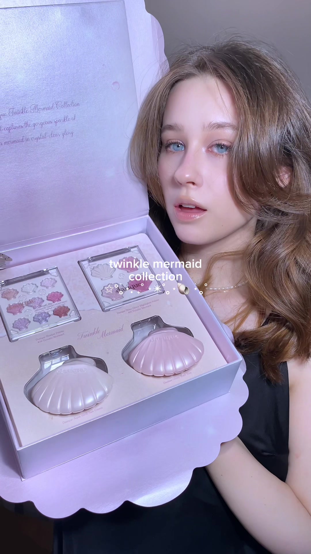 TikTok post by @deallias for Dasique. Caption reads: open dasique’s pr box with me ⋆✴︎˚｡⋆🐚 ⋆｡˚ [...].