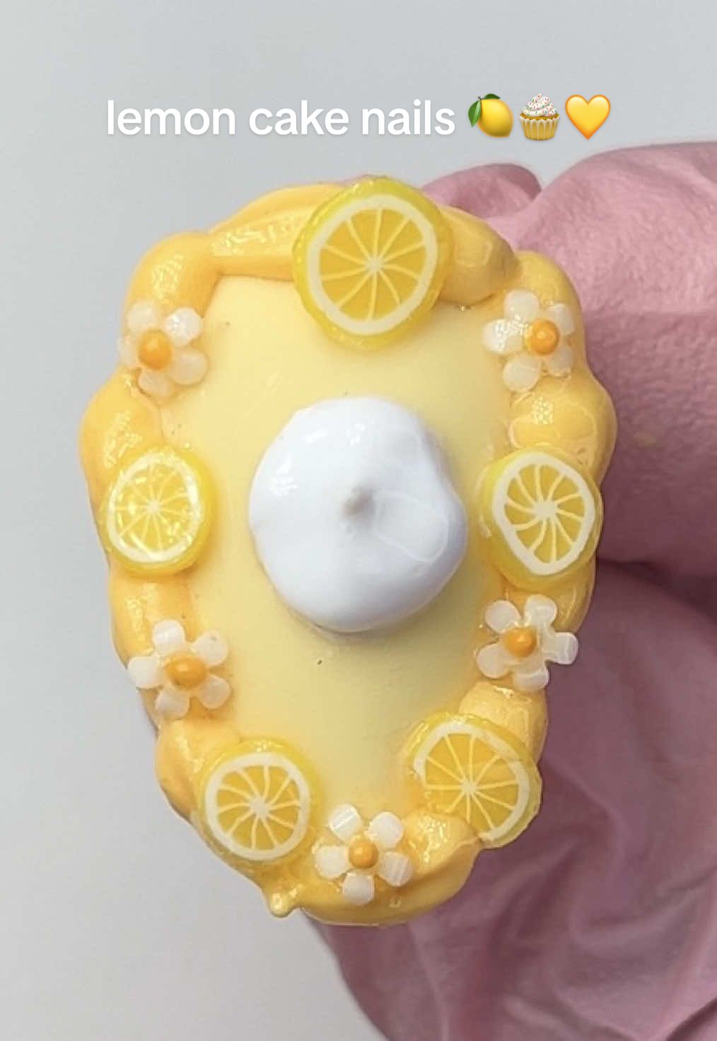 TikTok post by @beautybyzariii for BeetlesGelPolish. Caption reads: lemon cake nail tutorial! 🍋🧁💛 I made sure to....