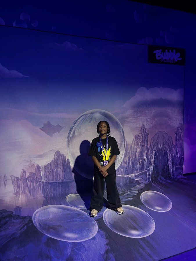 Instagram post by an influencer for Bubble Planet Experience. Caption reads: The Song says it all 🤘🏾....