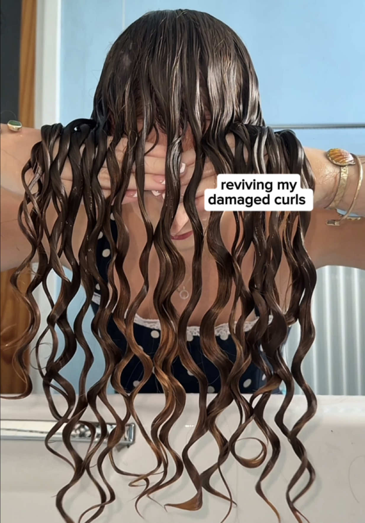 TikTok post by @mollysringlets for UMBERTO GIANNINI. Caption reads: Can I revive these neglected curls? 😳🩺🚑 AD I....