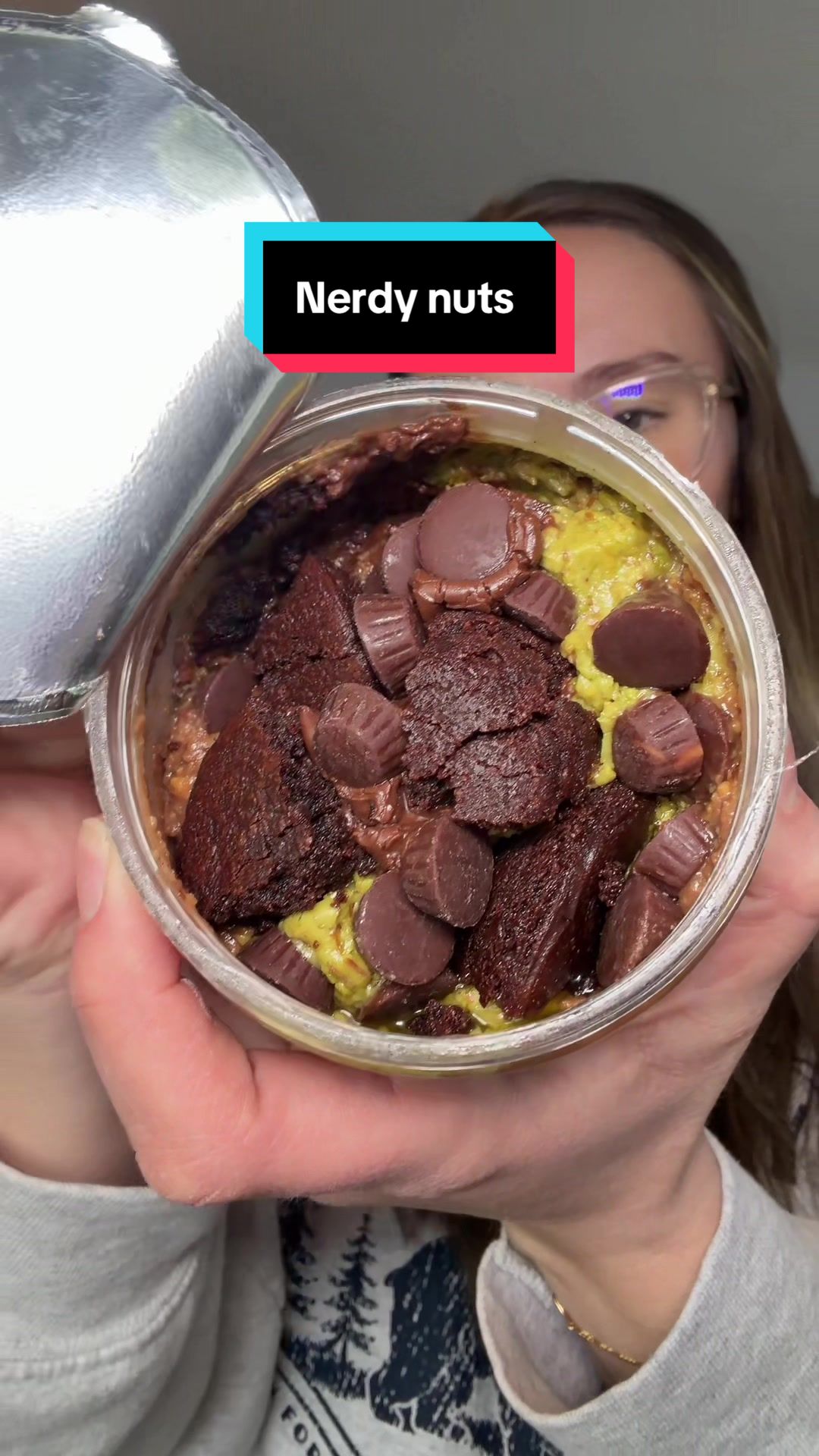 TikTok post by @kiraalvarez0414 for Nerdy Nuts. Caption reads: Never tried a product from @Nerdy Nuts Shop that....