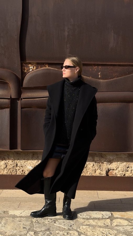 Instagram post by @oljaryz for Herno. Caption reads: City walks in @herno_official latest collection....