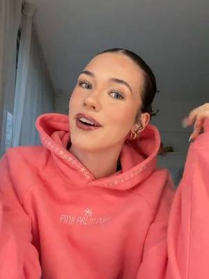TikTok post by @charliandbeck for Pink Palm Puff. Caption reads: the comfiest set ever @PINK PALM PUFF 💕🐚....