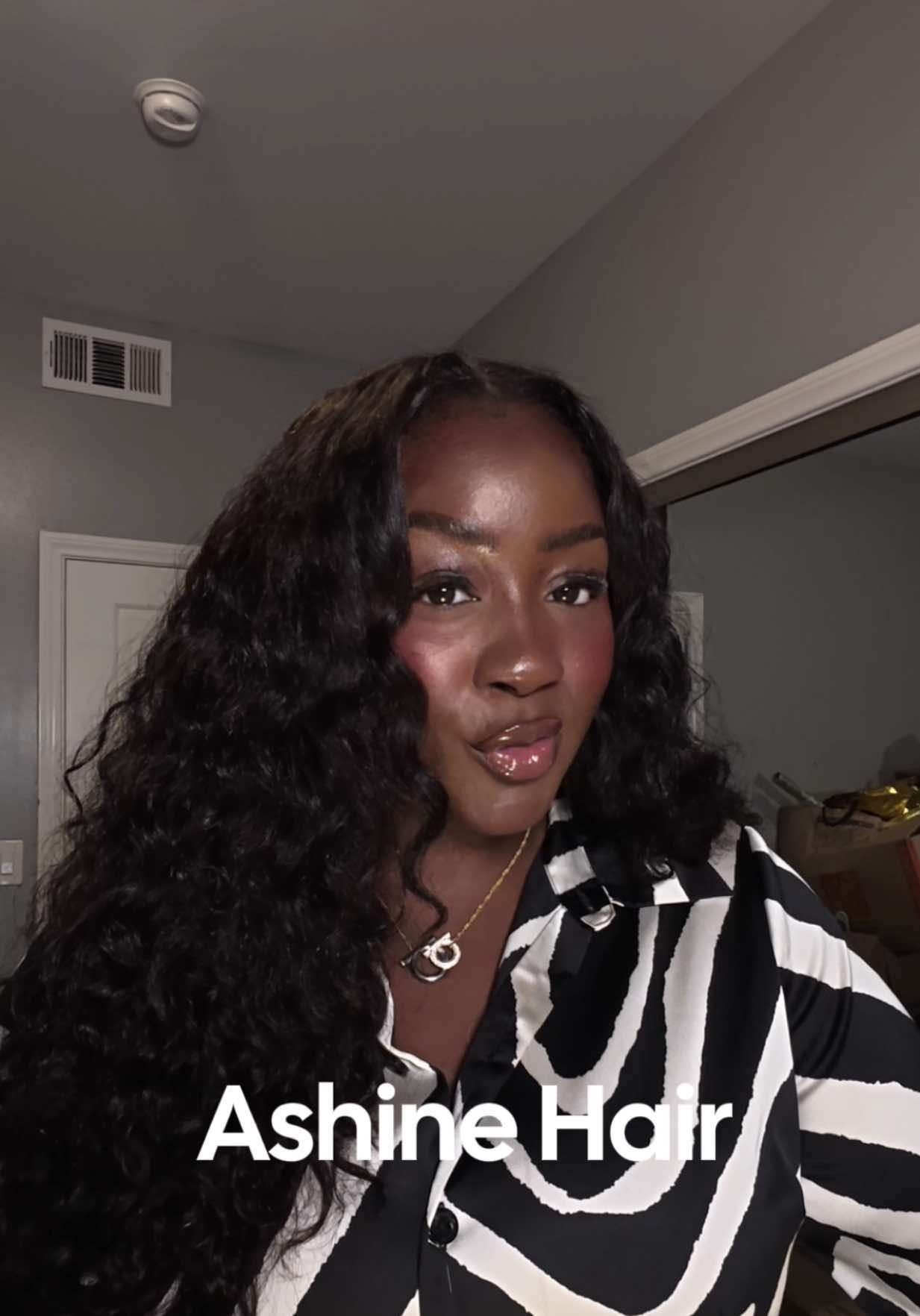 TikTok post by @adenike.mufasa for dpHUE. Caption reads: [...] obsessed with big curly hair. @Wella Pro....