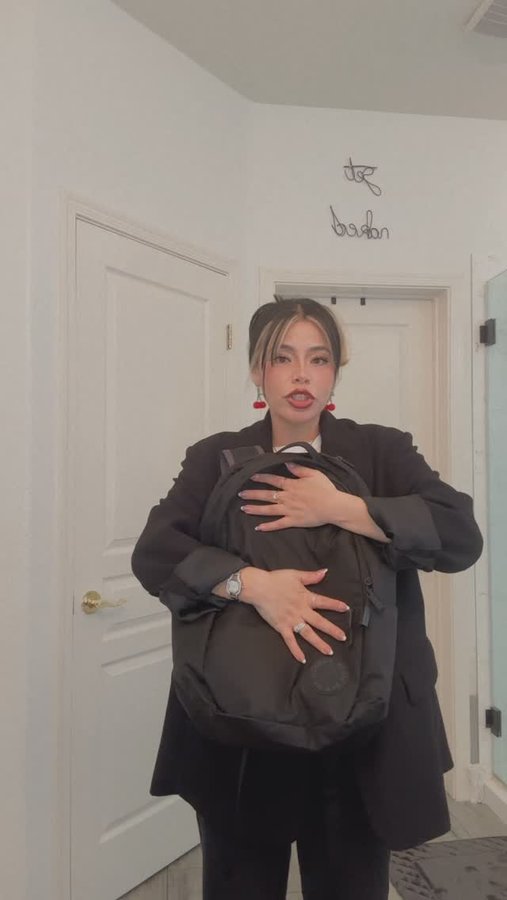 Instagram post by @priscilla_michelle for Baboon To The Moon. Caption reads: Obsessed with my new #baboontothemoon backpack!....