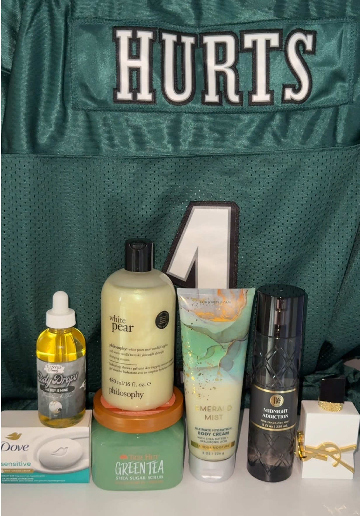 TikTok post by @selfcarewithtatiana for Bath & Body Works. Caption reads: help me pick out a @Philadelphia Eagles shower....