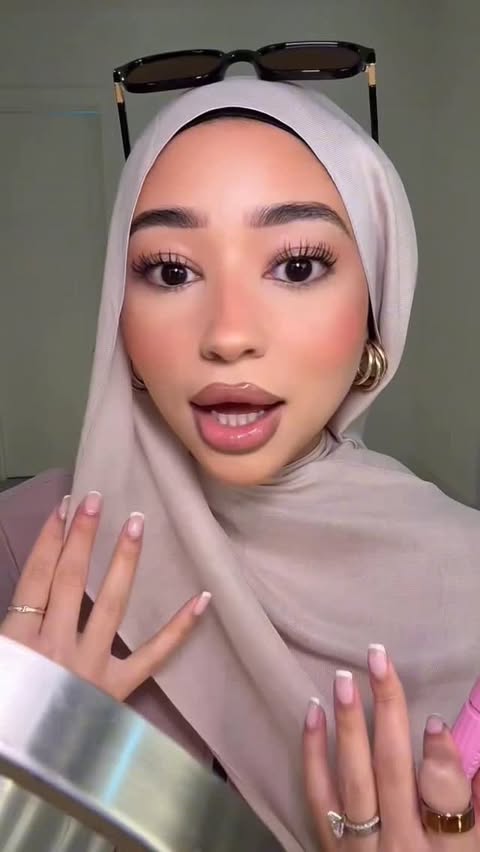 Instagram post by @by.imanx for COVERGIRL. Caption reads: @covergirl’s Wrap Tubing Mascara is Miami-approved....