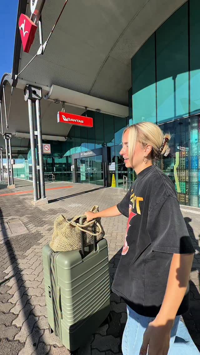 Instagram post by @esterapawlak for Qantas. Caption reads: Reunited with our babies after two weeks apart,....