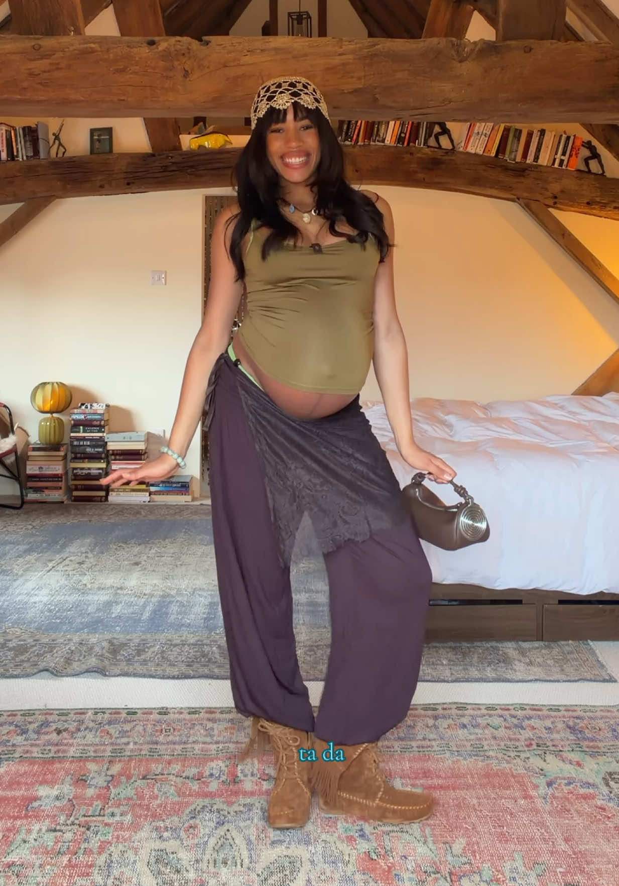 TikTok post by @iwanacristal for H&M. Caption reads: [...] pregnant. Absolutely everything is from @H&M....