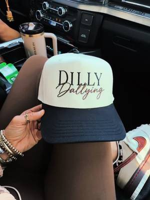 TikTok post by @thesouthernpost7 for The Mad Hatter Company. Caption reads: Dilly Dally @The Mad Hatter Company.