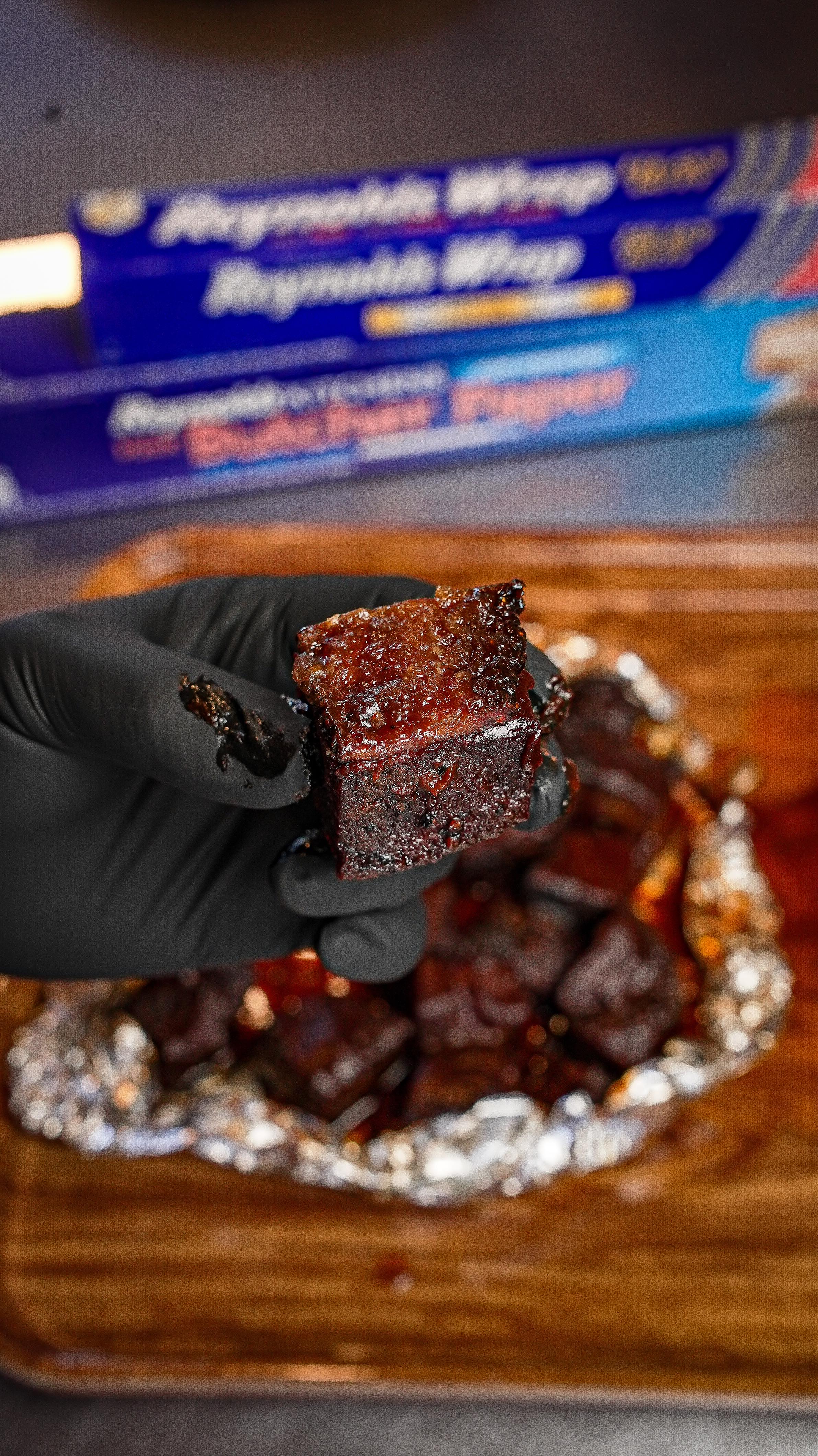 Instagram post by @tfti.bbq for Reynolds Brands. Caption reads: #ad Candied Bacon Beef Burnt Ends
Thanks to....