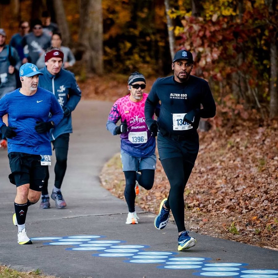 Instagram post by @amirhunter_realestate for Alter Ego Running. Caption reads: [...] complaints in 42 degree weather!....