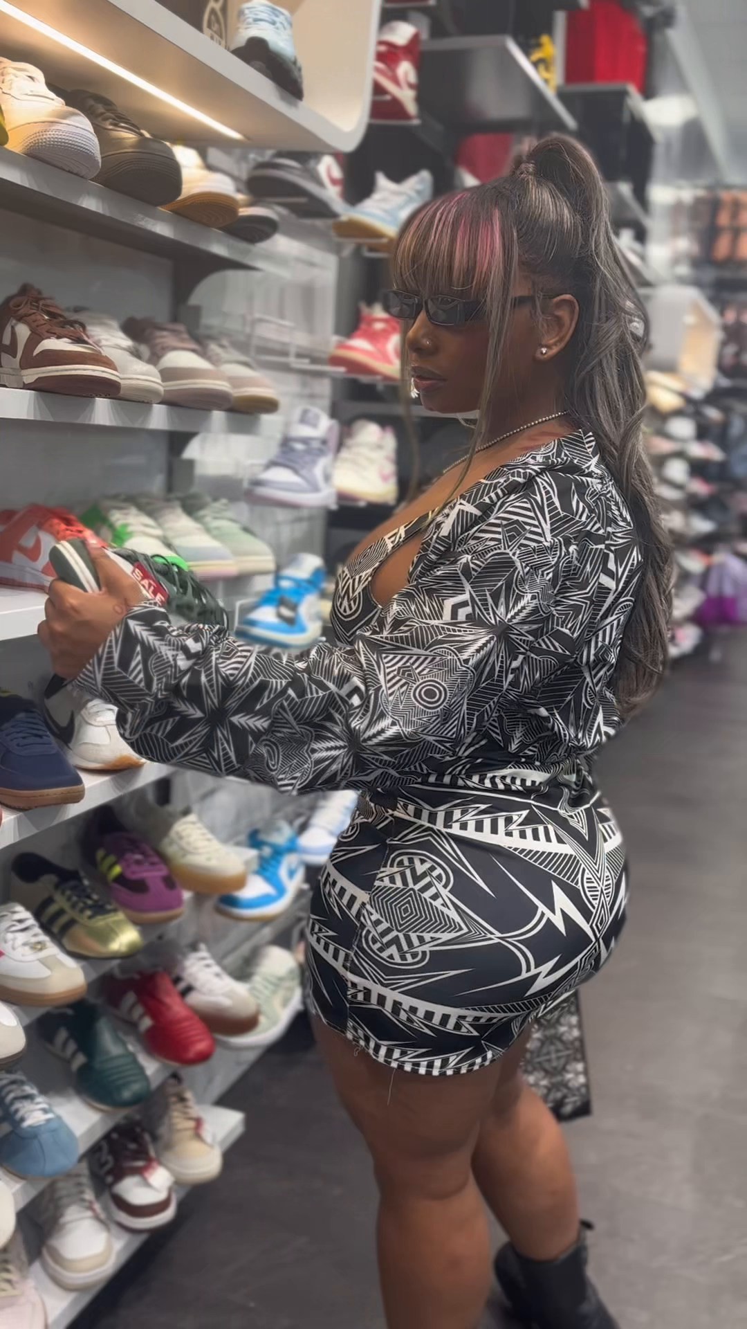 Instagram post by @theasianae for Hibbett. Caption reads: Artist Asianae (@theasianae) stopped by our....