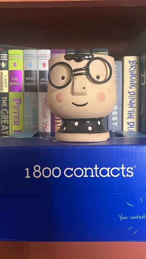 Instagram post by @bathtubbookworm for 1800 Contacts. Caption reads: #ad When your brand is based on having working....