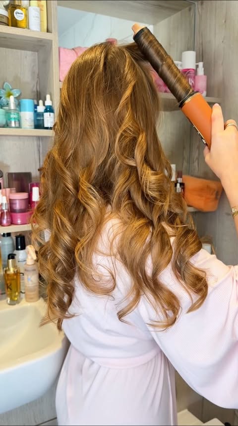 Instagram post by @byemmaleah for Dreame. Caption reads: The Ultimate Bouncy Blowout Routine featuring the....