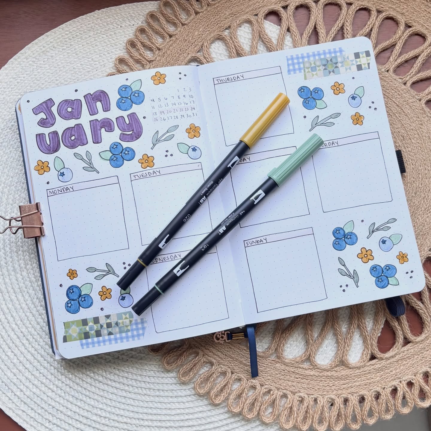 Instagram post by @junebug.doodles_ for Archer and Olive. Caption reads: [...] get 15% off your Tombow purchase 📓....