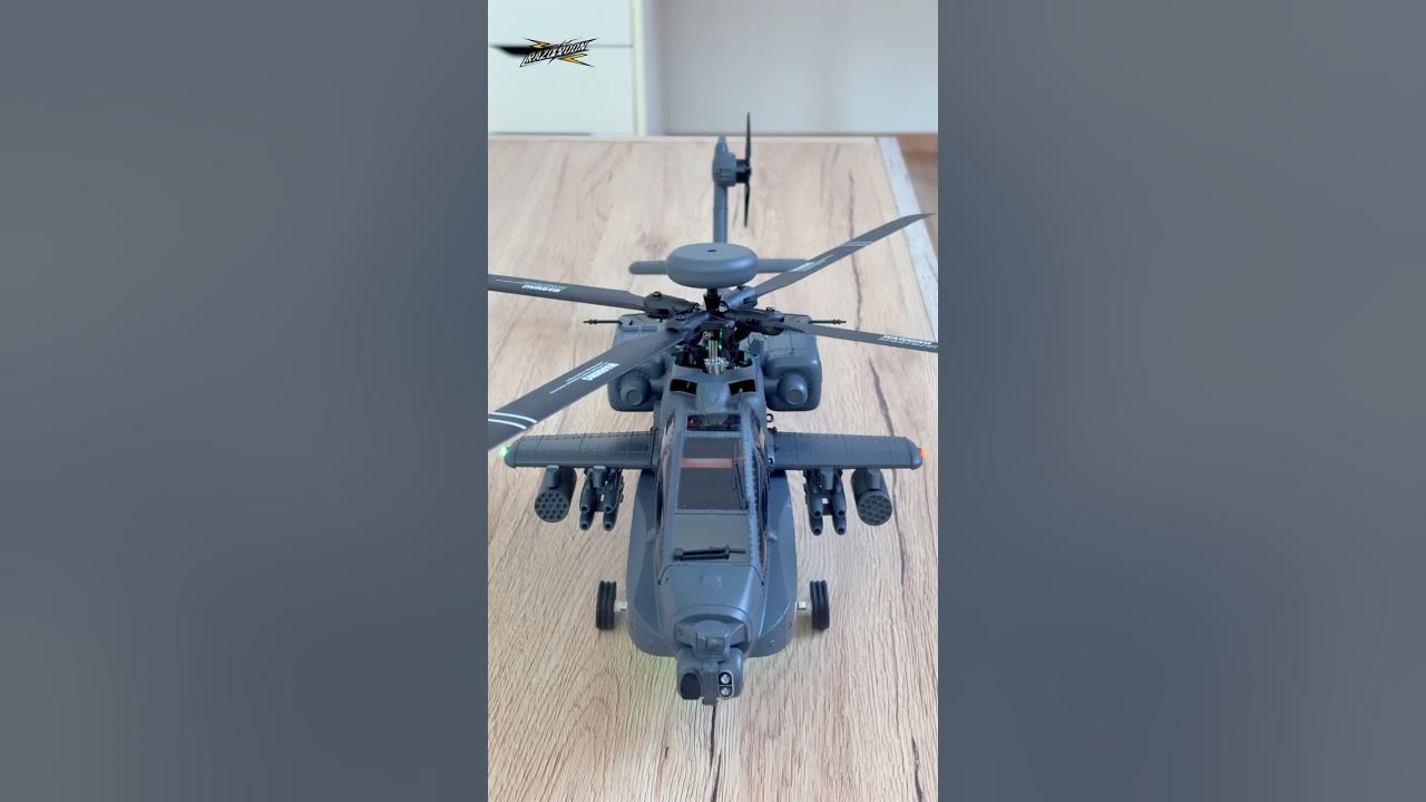 YouTube post by @AndrejSturm for Banggood. Caption reads: Apache GPS Helicopter | YU XIANG F11-S AH64 |....