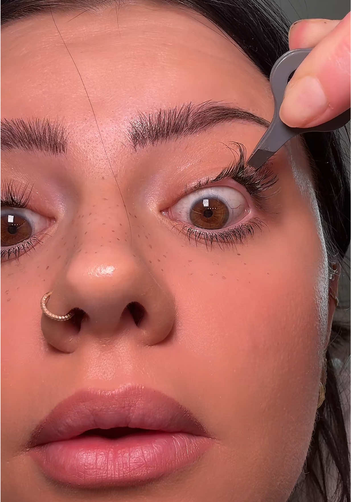 TikTok post by @kristidmytrenko for Eyeshine Cosmetics. Caption reads: [...] clusters ever! Classic style by @Eyeshine....