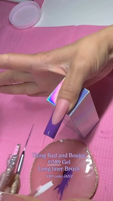 Instagram post by @janz.nailz for VBeautyPure. Caption reads: 💜💜💜 Use code: JANZ for all ur @vbeautypure....