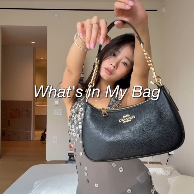 Instagram post by @hjevelyn for Coach. Caption reads: What’s in my @coach teri bag for @GovBallNYC....