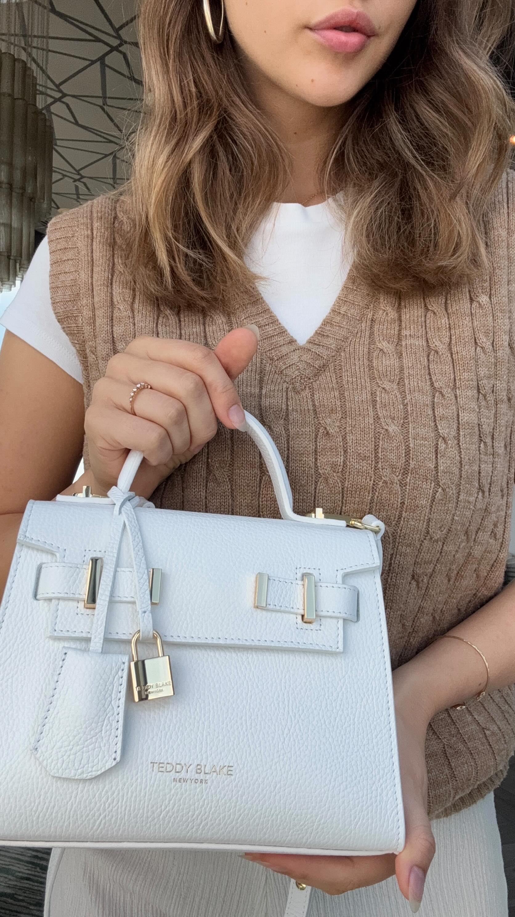 Instagram post by @maarjamour for Teddy Blake. Caption reads: Girlsssss I just found my dream bag🥹

I’ve been....