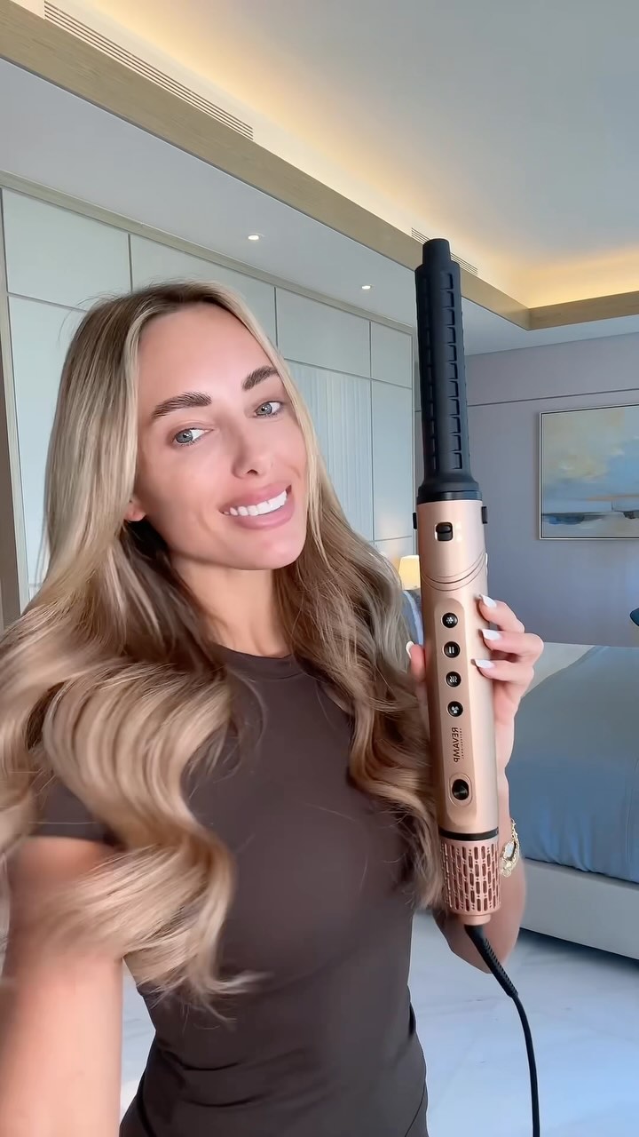 Instagram post by @amberturnerx for Argos. Caption reads: Time to get glam for Christmas ✨💛 I am obsessed....