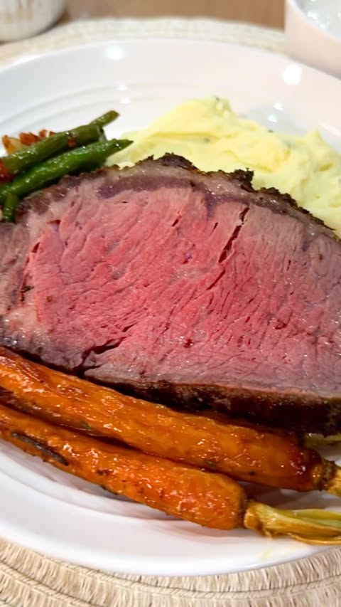 Instagram post by @thebateskitchen for The Feedfeed. Caption reads: (ad) This Prime Strip Roast is a slow-roasted,....