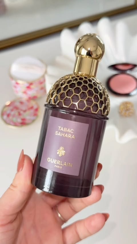 Instagram post by @lory__lorena for The Perfume Shop. Caption reads: ✨Guerlain Tabac Sahara Eau de Parfum — a fragrance....