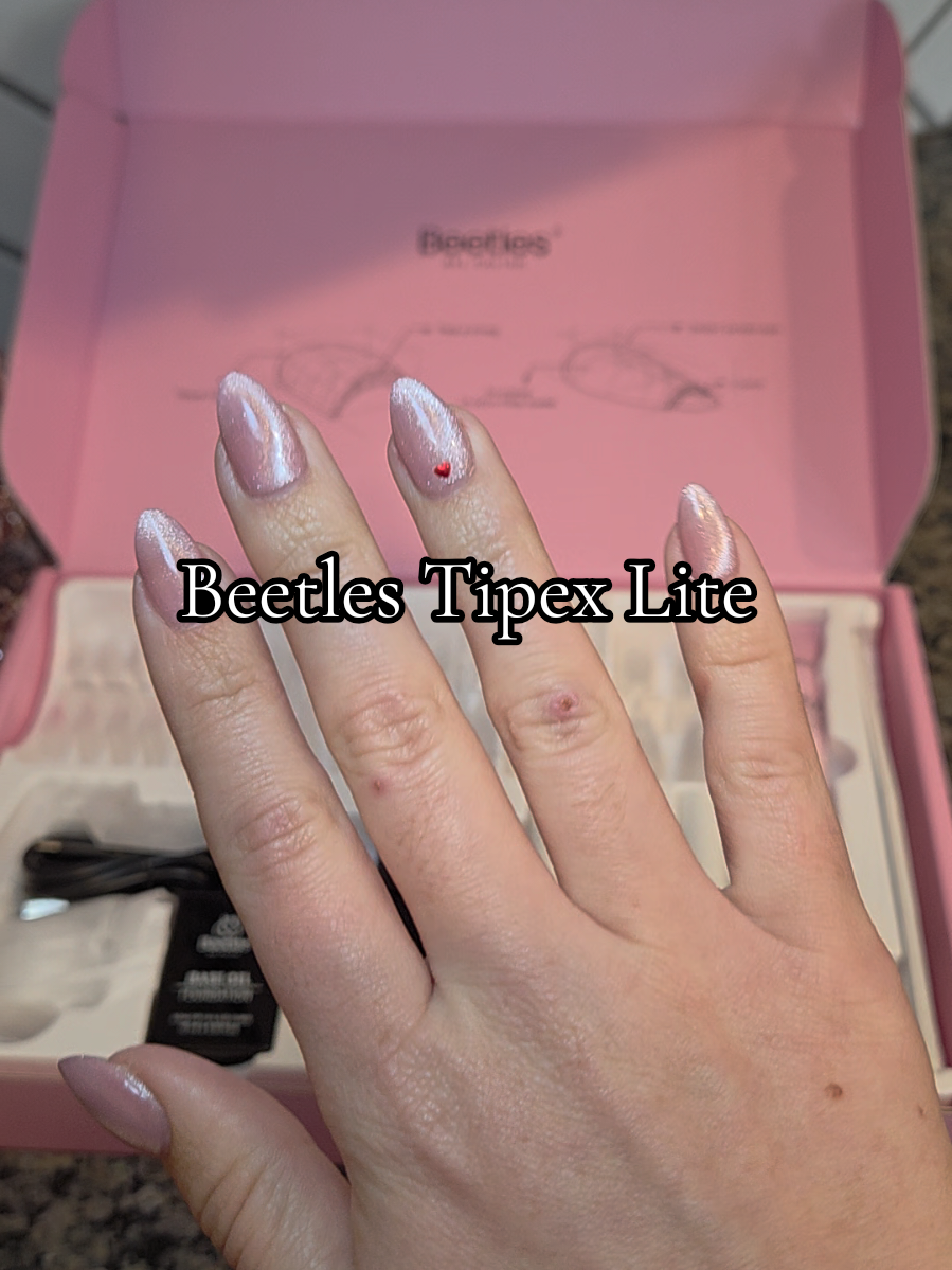 TikTok post by @holiday.nails.and.vibes for BeetlesGelPolish. Caption reads: [...] beetles tipex lite kit @BeetlesGelPolish....