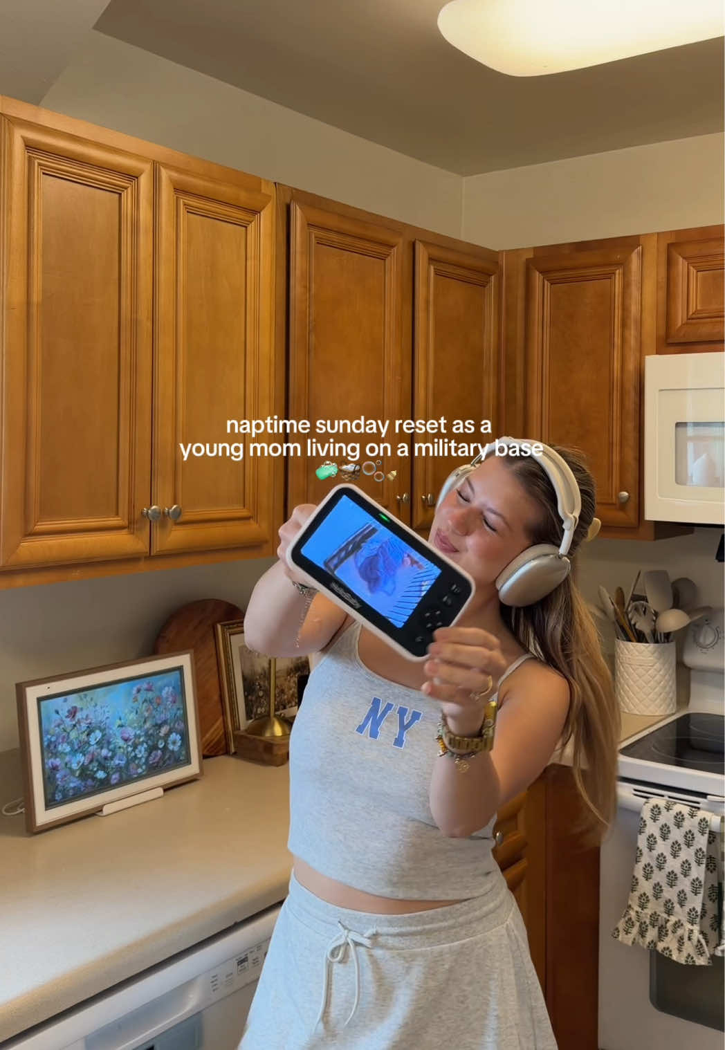 TikTok post by @sarahndudley for Emi Jay. Caption reads: [...] #sahm @Bloom Nutrition @onequince @Emi Jay....